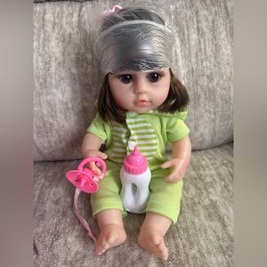 Sweet Baby Doll in Lime Green Outfit with Pink Accessories